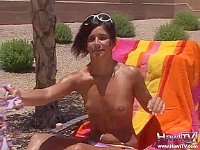 Hot teen sunbathing outdoors in the hot sun